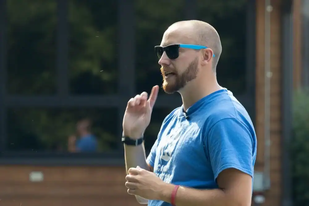 Tommy Losch directing camp