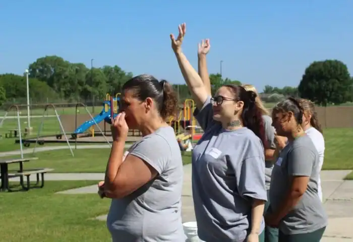 Mothers waving goodbye