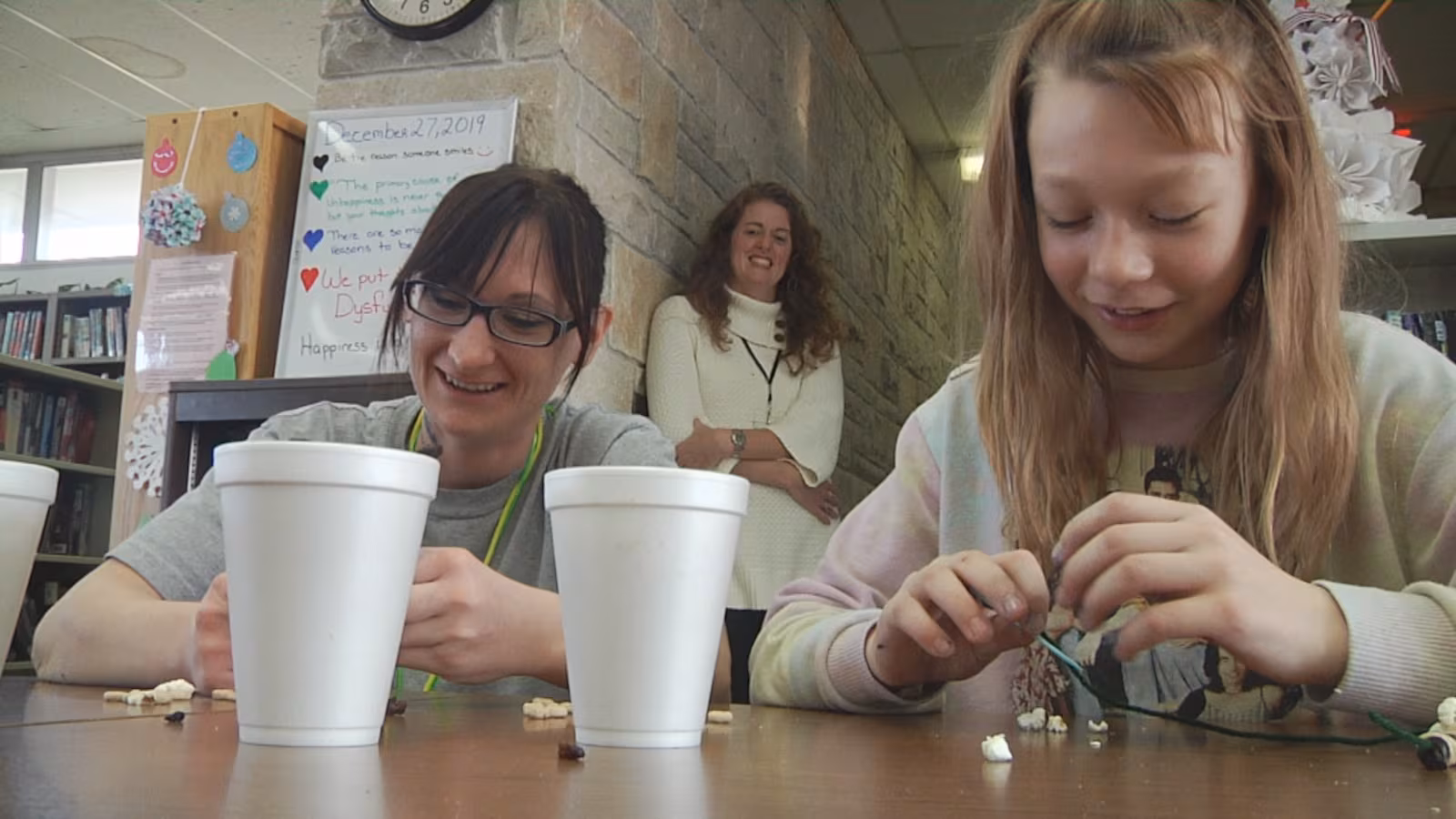 A Mother and Daughter create a craft together