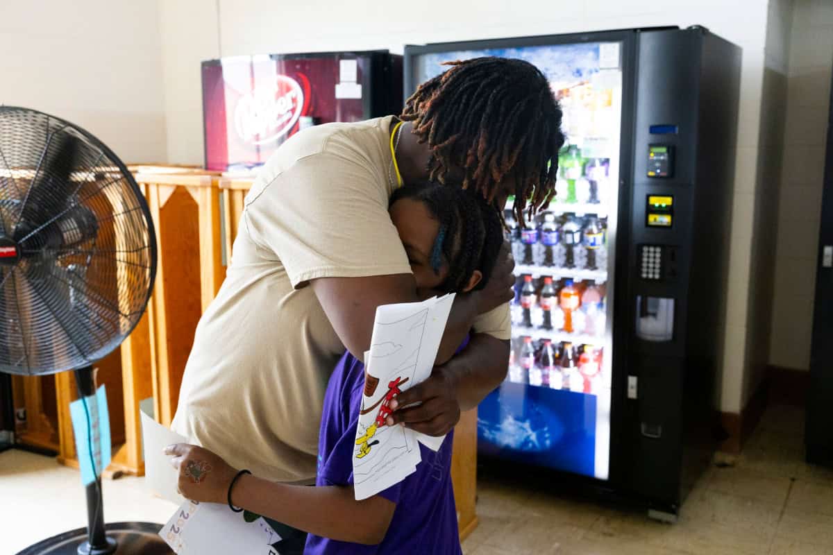 Father hugging son