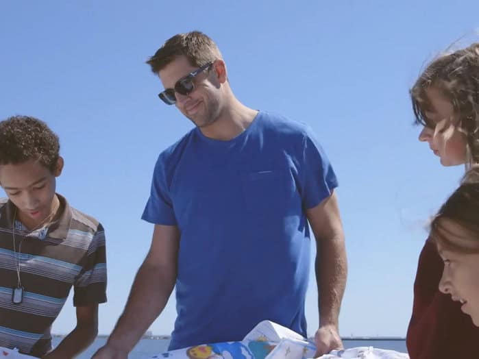 The "It's Aaron" campaign released a new video, featuring the QB working with Camp Hometown Heroes.